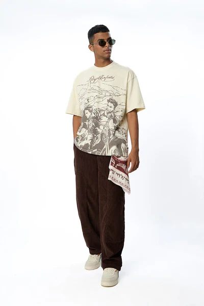 A man wearing a stylish custom T-shirt from the best t shirt design website, showcasing unique and creative fashion